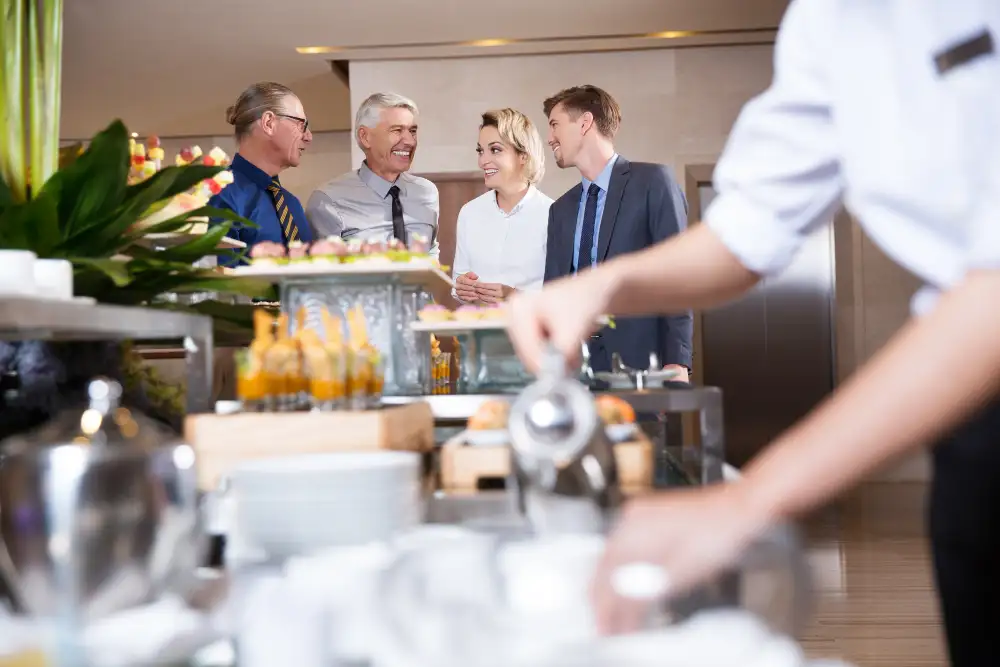 Employees enjoying a corporate event, rapport at the business event buffet